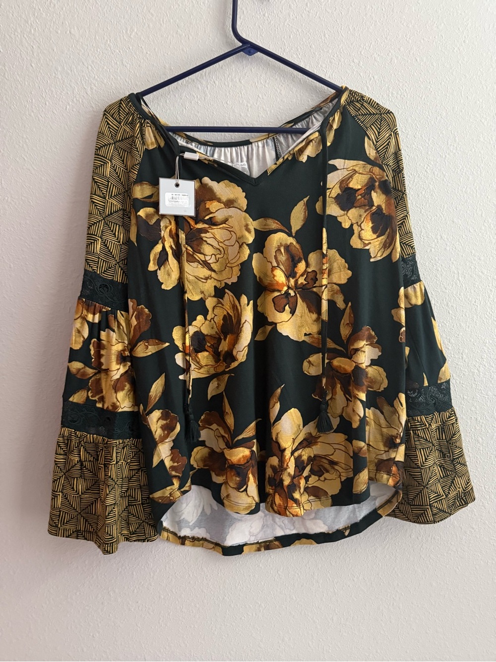 Cupio Black Top with Gold Floral Print and Patterned Bell Sleeves